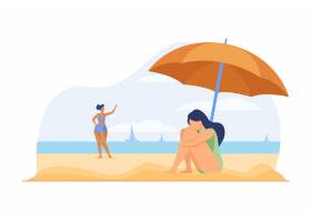 海滩上抑郁的女人伤心的女孩坐在雨伞下的_11671482