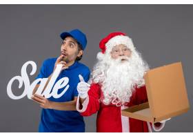 圣诞老人正面图有拿着销售文字和空的食物箱