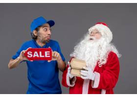 圣诞老人正面图有拿着销售横幅和食物包裹的_11577437