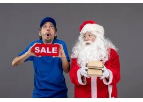 圣诞老人正面图有拿着销售横幅和食物包裹的_11577460