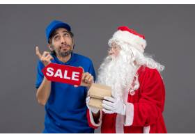 圣诞老人正面图有拿着销售横幅和食物包裹的_11577486