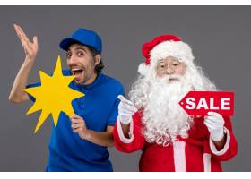 圣诞老人正面图有拿着销售横幅和黄色标志在_11577551