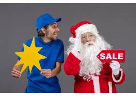 圣诞老人正面图有拿着销售横幅和黄色标志的_11577622