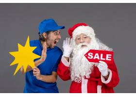 圣诞老人正面图用拿着黄色标志和销售横幅的